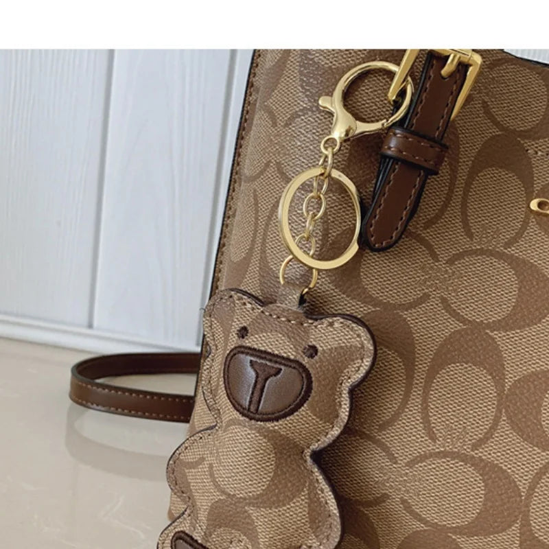Elegant Monogram Tote Bag in Classic Style for Women Featuring Retro Leather Trim and Detachable Strap