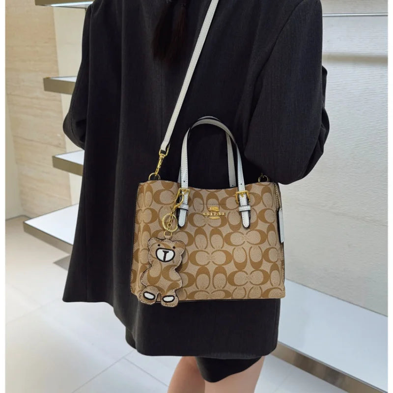 Elegant Monogram Tote Bag in Classic Style for Women Featuring Retro Leather Trim and Detachable Strap