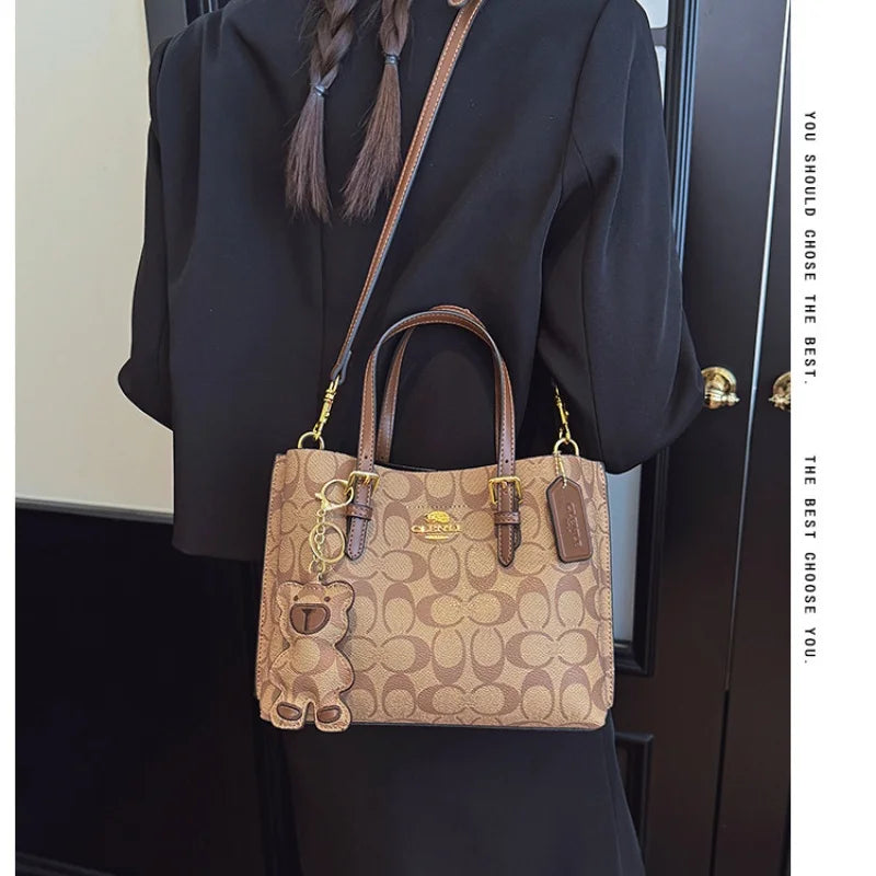 Elegant Monogram Tote Bag in Classic Style for Women Featuring Retro Leather Trim and Detachable Strap