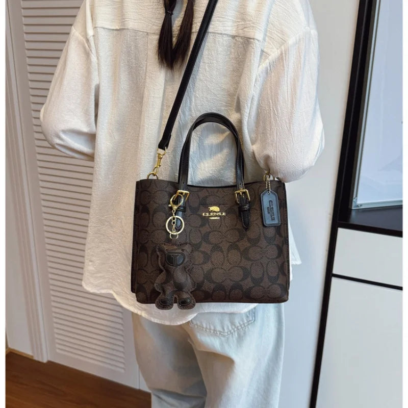 Elegant Monogram Tote Bag in Classic Style for Women Featuring Retro Leather Trim and Detachable Strap