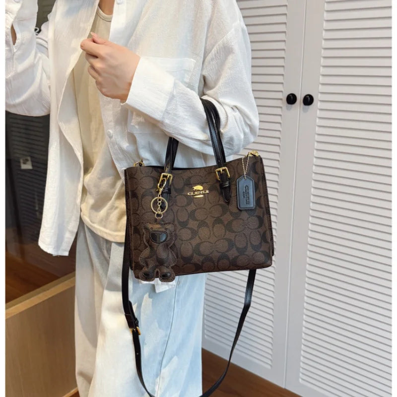 Elegant Monogram Tote Bag in Classic Style for Women Featuring Retro Leather Trim and Detachable Strap