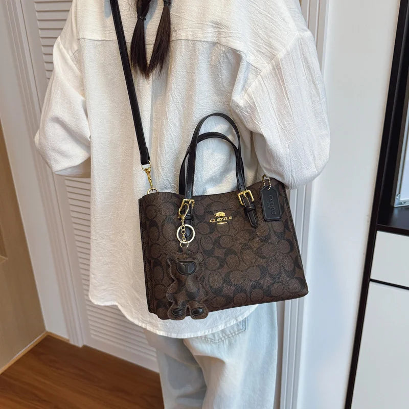 Elegant Monogram Tote Bag in Classic Style for Women Featuring Retro Leather Trim and Detachable Strap