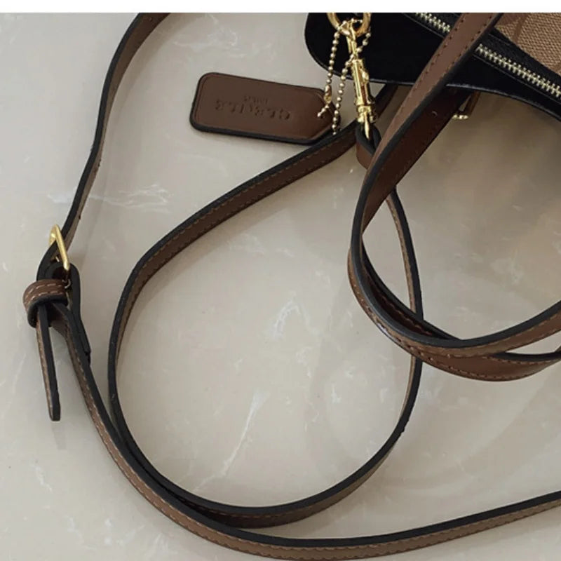 Elegant Monogram Tote Bag in Classic Style for Women Featuring Retro Leather Trim and Detachable Strap