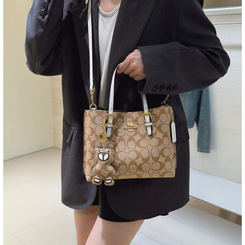 Elegant Monogram Tote Bag in Classic Style for Women Featuring Retro Leather Trim and Detachable Strap
