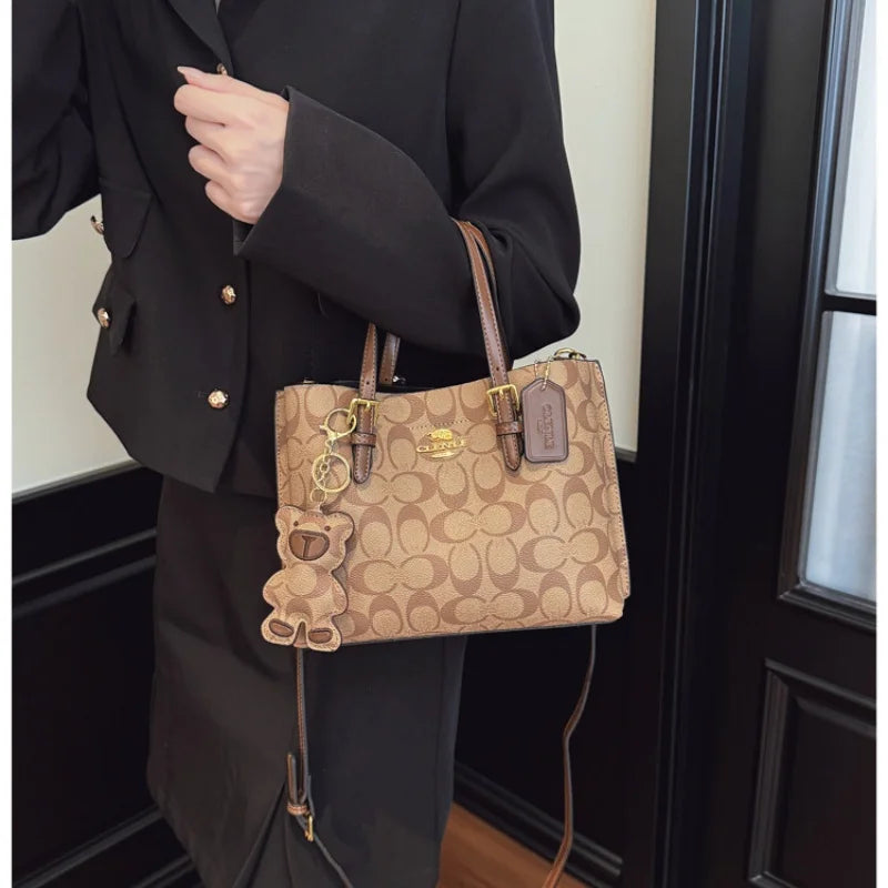 Elegant Monogram Tote Bag in Classic Style for Women Featuring Retro Leather Trim and Detachable Strap